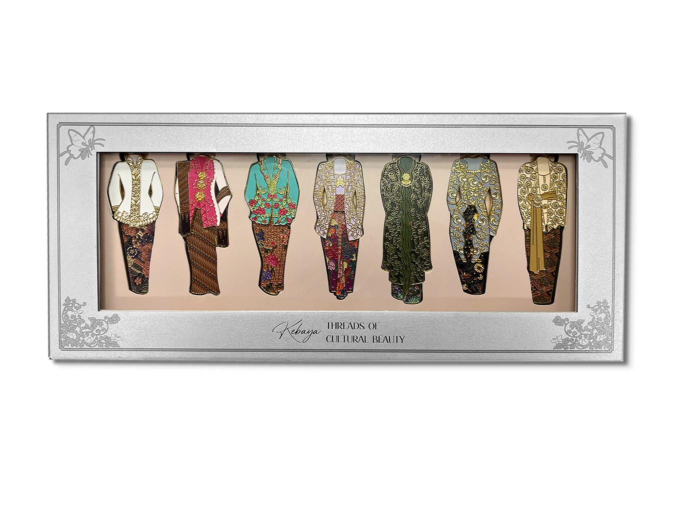 The “Kabaya: The Beauty of Weaving Culture” magnet package displays seven styles of Kabaya, each with interchangeable tops and skirts. (Provided by Singapore Mint)