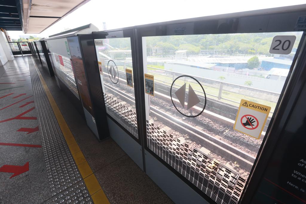 A man breaks into subway tracks to pick up his mobile phone and enters the station and the train stops urgently