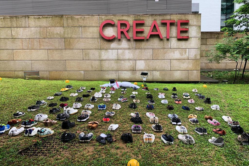 National University of China puts shoes on grass protesting Israeli-Kazakhstan conflict police launch investigation